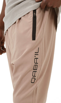 QL Pantalon Cross Over in Taupe