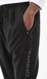 QL Pantalon Cross Over in Black