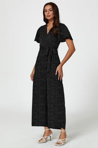 Dot Print Wrap Top Jumpsuit In Black