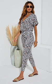 Stretch Wrap Jumpsuit With V Neck In Animal Print