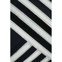 Bosie Safira Black and White Hair on Leather Cushion