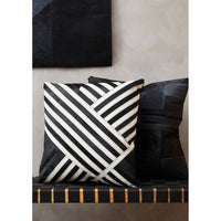 Bosie Safira Black And Grey Hair on Leather Cushion