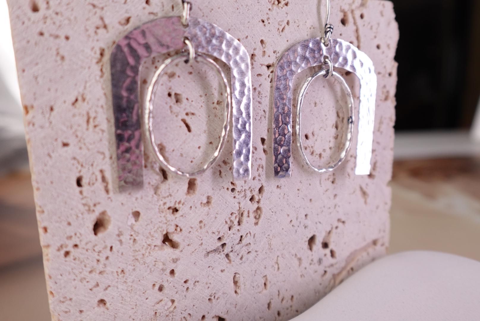 Hammered Horseshoe Brass Earrings - Statement earrings with a bold arch and hammered finish in gold-tone brass.