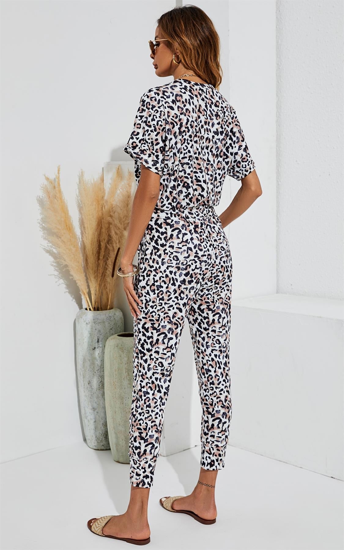 Stretch Wrap Jumpsuit With V Neck In Animal Print