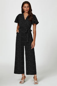 Dot Print Wrap Top Jumpsuit In Black