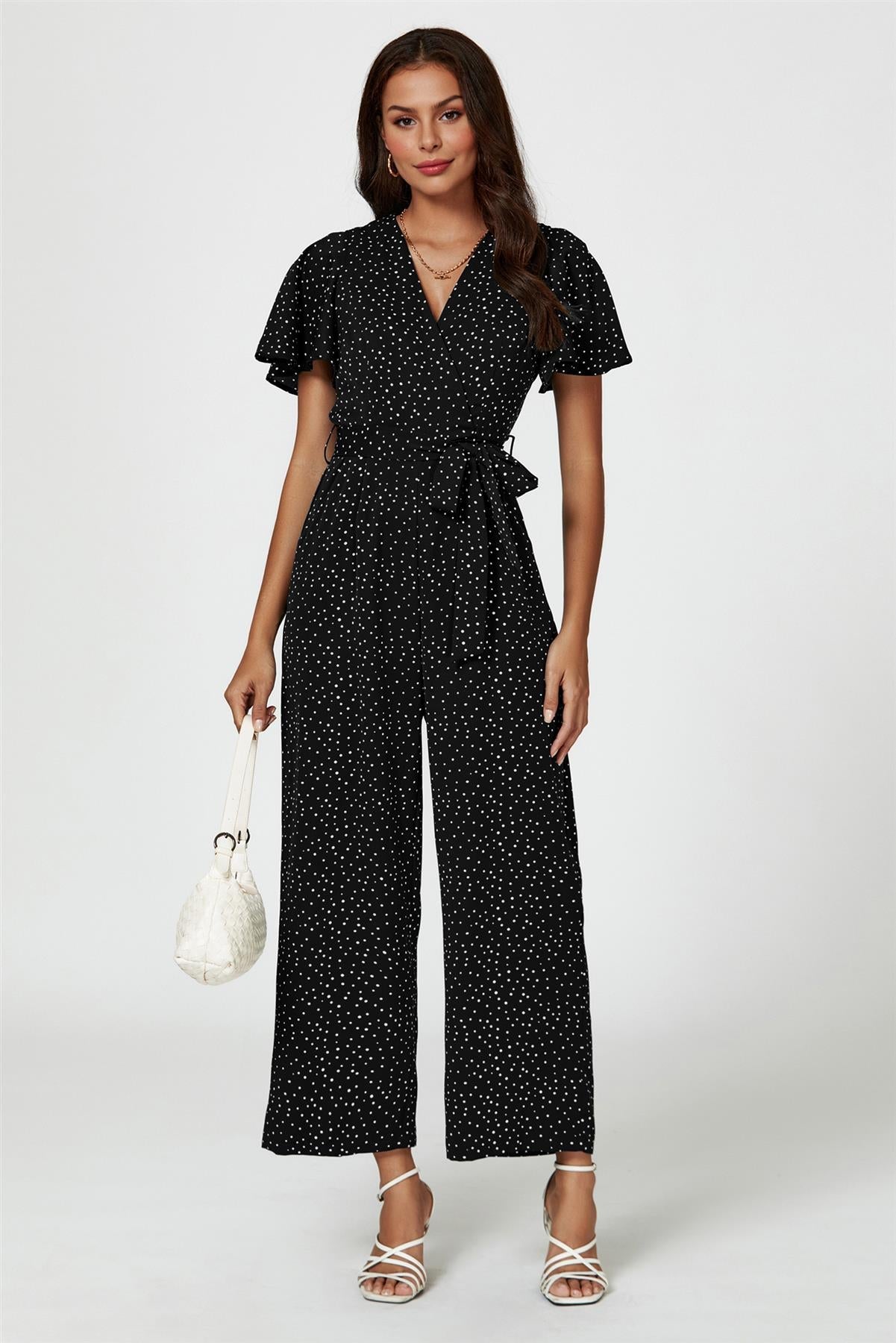 Dot Print Wrap Top Jumpsuit In Black