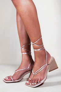 TEAGAN STRAPPY PYRAMID BLOCK HEEL SANDAL WITH LACE UP DETAIL IN CHAMPAGNE SILK