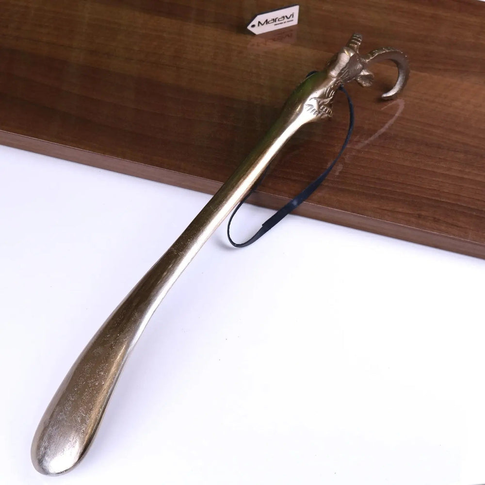 Kaisa Ram's Head Antique Gold Shoe Horn for Stylish and Effortless Wear