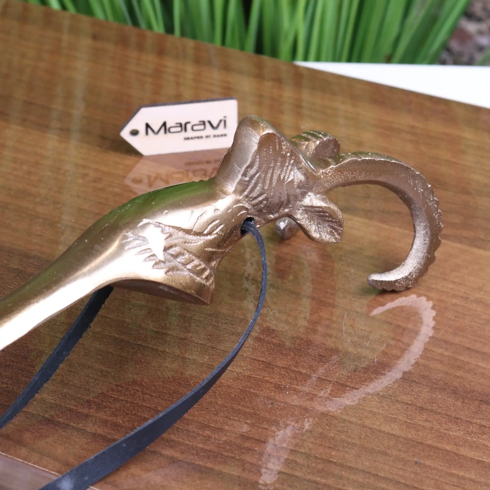 Kaisa Ram's Head Antique Gold Shoe Horn for Stylish and Effortless Wear
