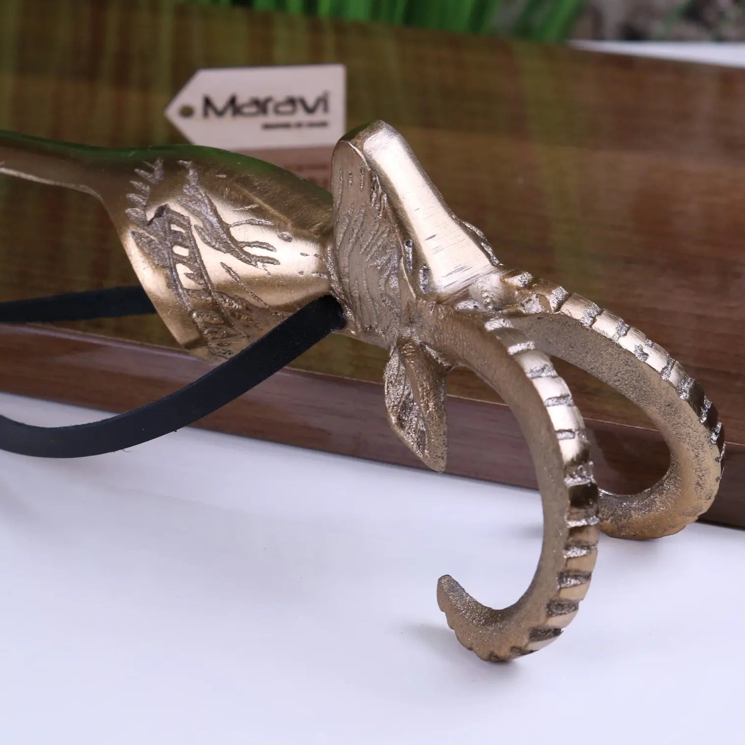 Kaisa Ram's Head Antique Gold Shoe Horn for Stylish and Effortless Wear