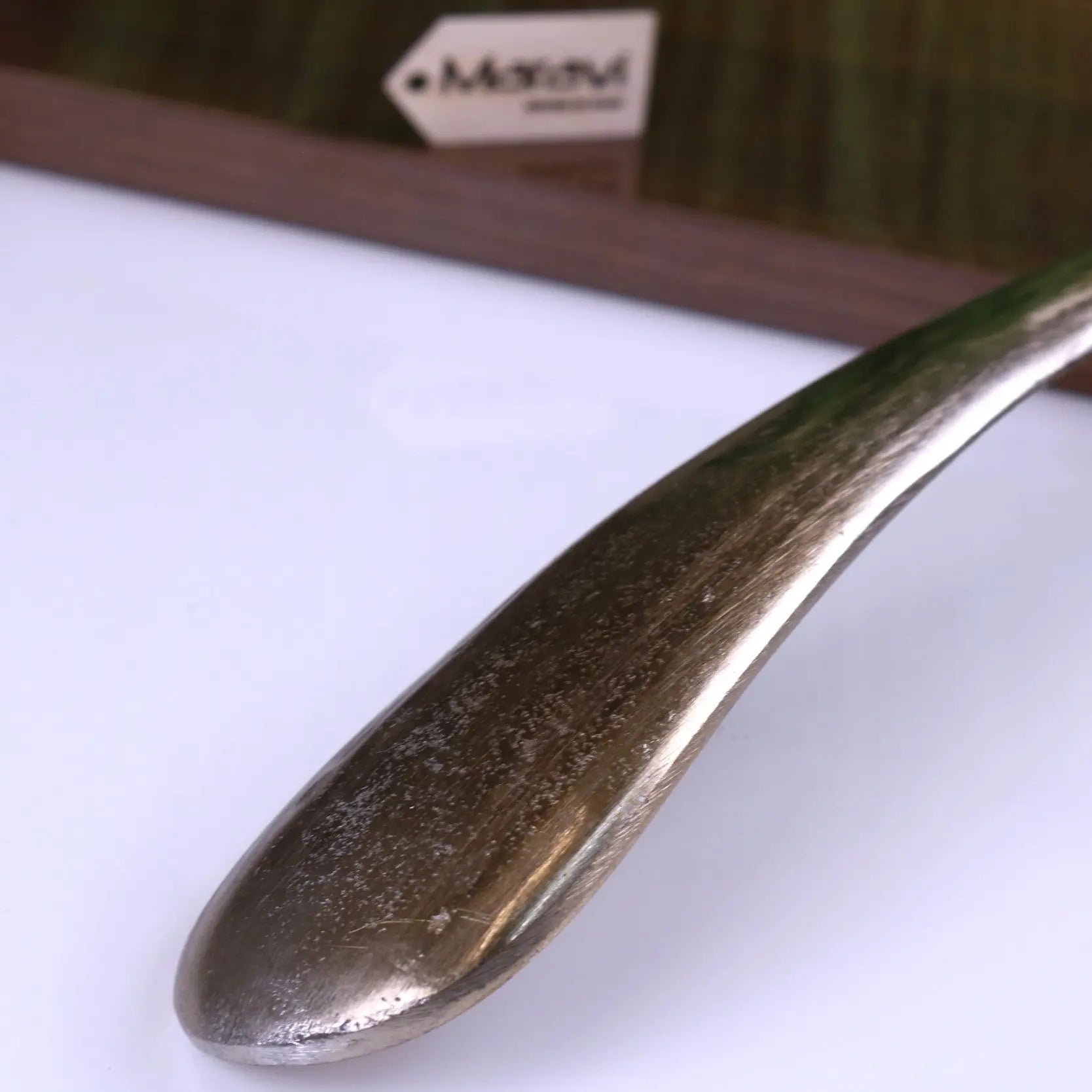 Kaisa Ram's Head Antique Gold Shoe Horn for Stylish and Effortless Wear