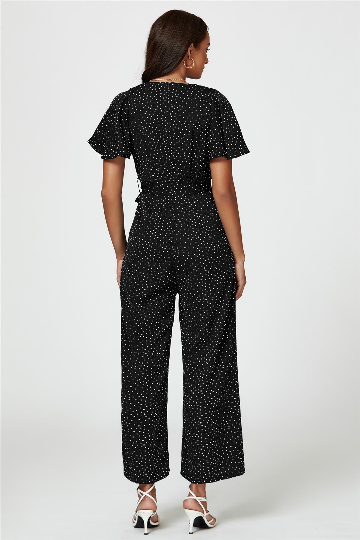 Dot Print Wrap Top Jumpsuit In Black