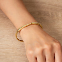 Gold Plated Arc Bangle Created with Zircondia® Crystals (7 Inch)
