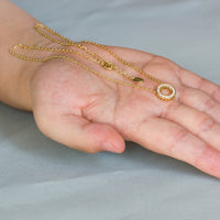 Gold Plated Circle of Life Necklace Created with Zircondia® Crystals