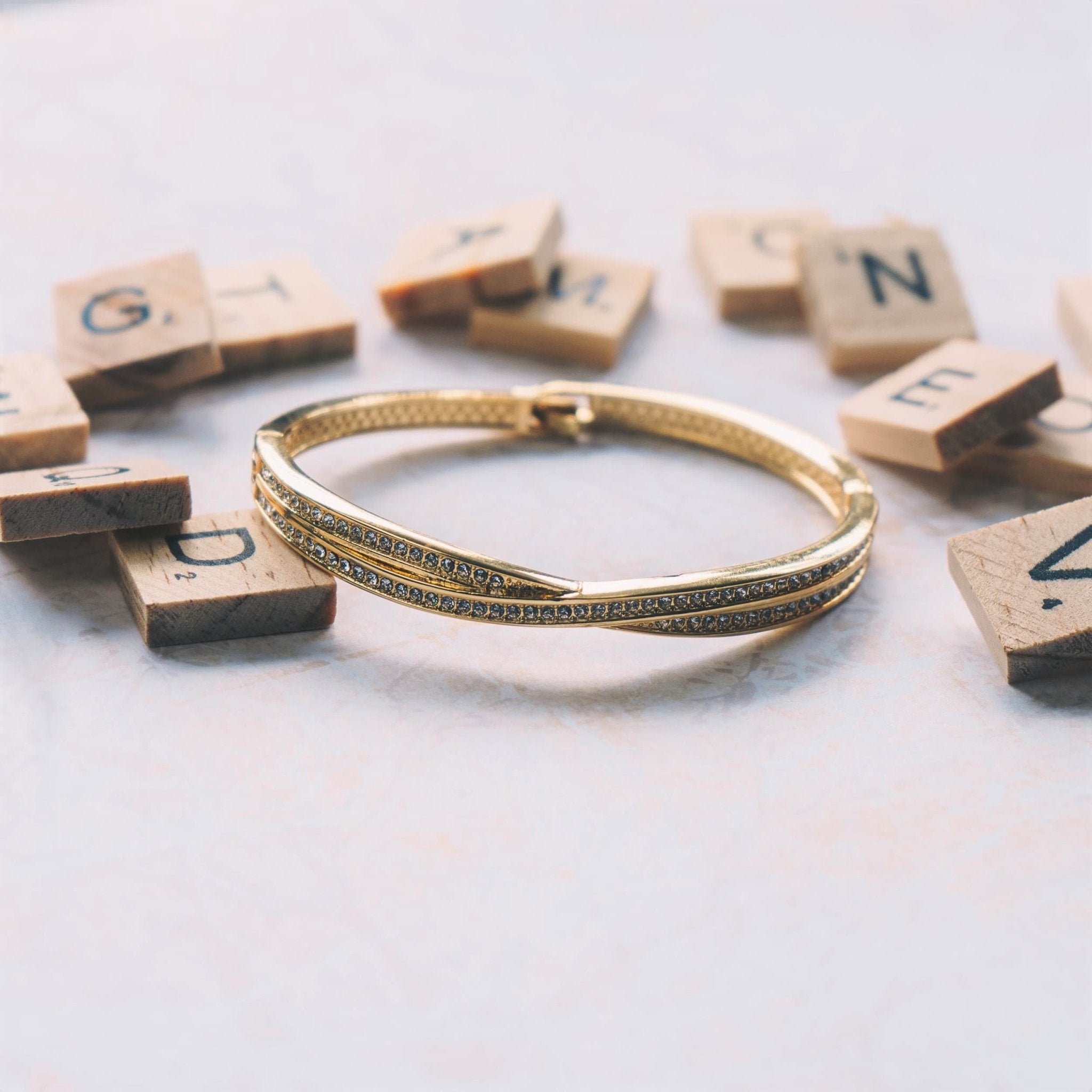 Gold Plated Crossover Bangle Created with Zircondia® Crystals (7 Inch)