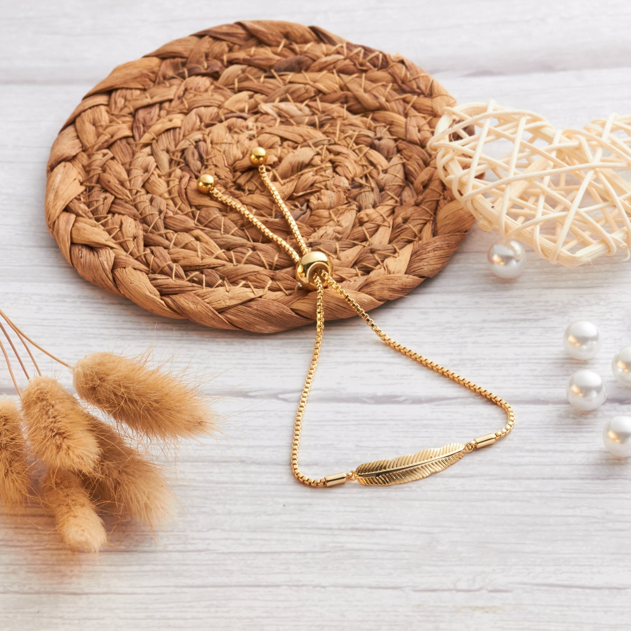 Gold Plated Feather Friendship Bracelet Created with Zircondia® Crystals