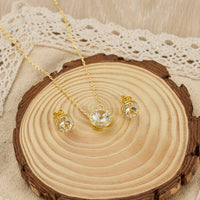 Gold Plated Halo Set Created with Zircondia® Crystals