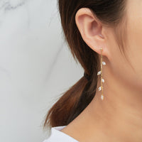 Gold Plated Leaf Dangle Earrings Created with Zircondia® Crystals