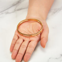 Gold Plated Stainless Steel Channel Bangle Created with Zircondia® Crystals (7 Inch)