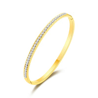 Gold Plated Stainless Steel Channel Set Bangle Created with Zircondia® Crystals (7 Inch)