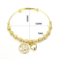Gold Plated Tree of Life Bangle Created with Zircondia® Crystals