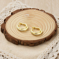 Gold Plated Triple Illusion Hoop Earrings Created with Zircondia® Crystals