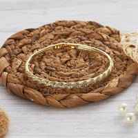 Gold Plated Twist Bangle Created with Zircondia® Crystals (7 Inch)