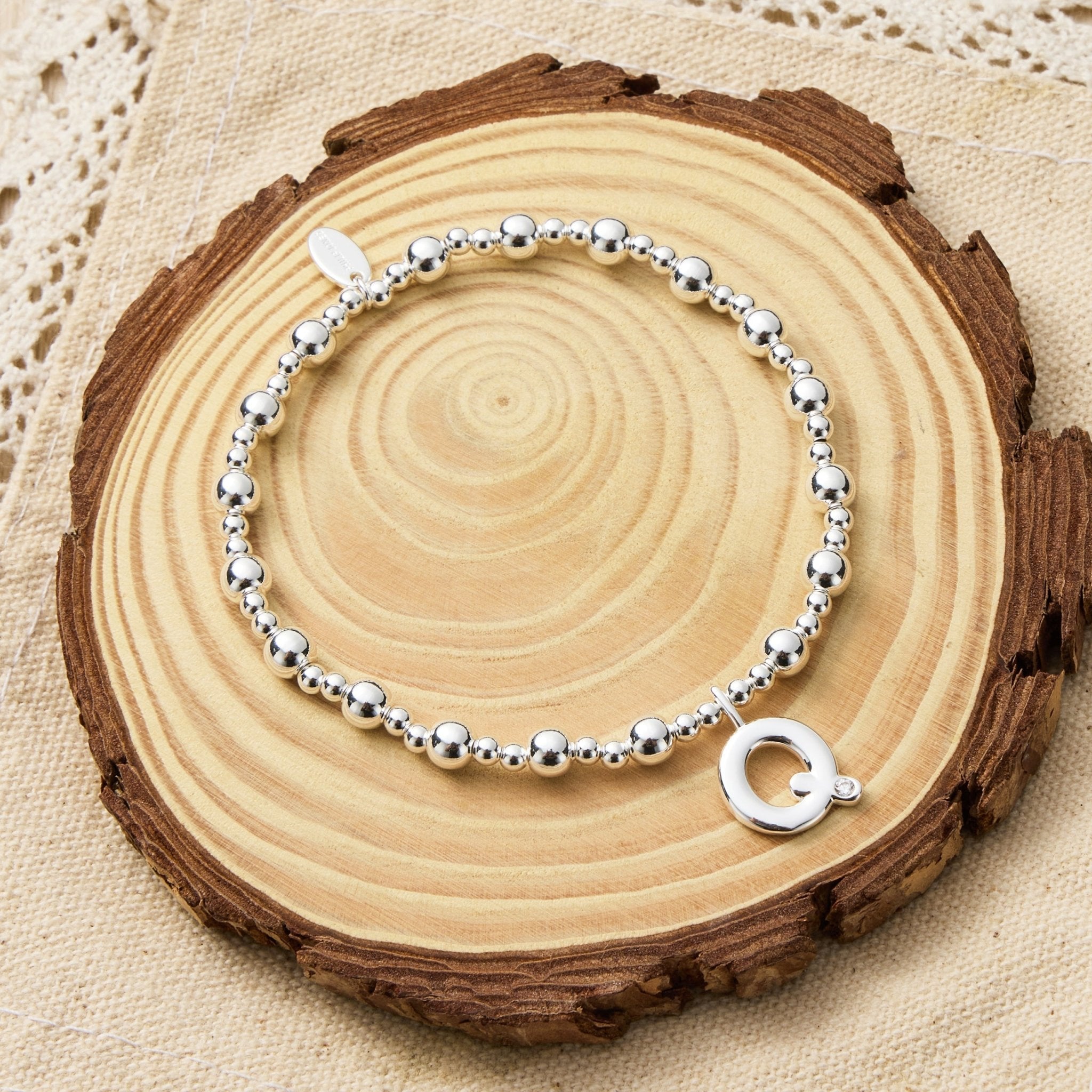 Letter Q Initial Stretch Bracelet Created with Zircondia® Crystals