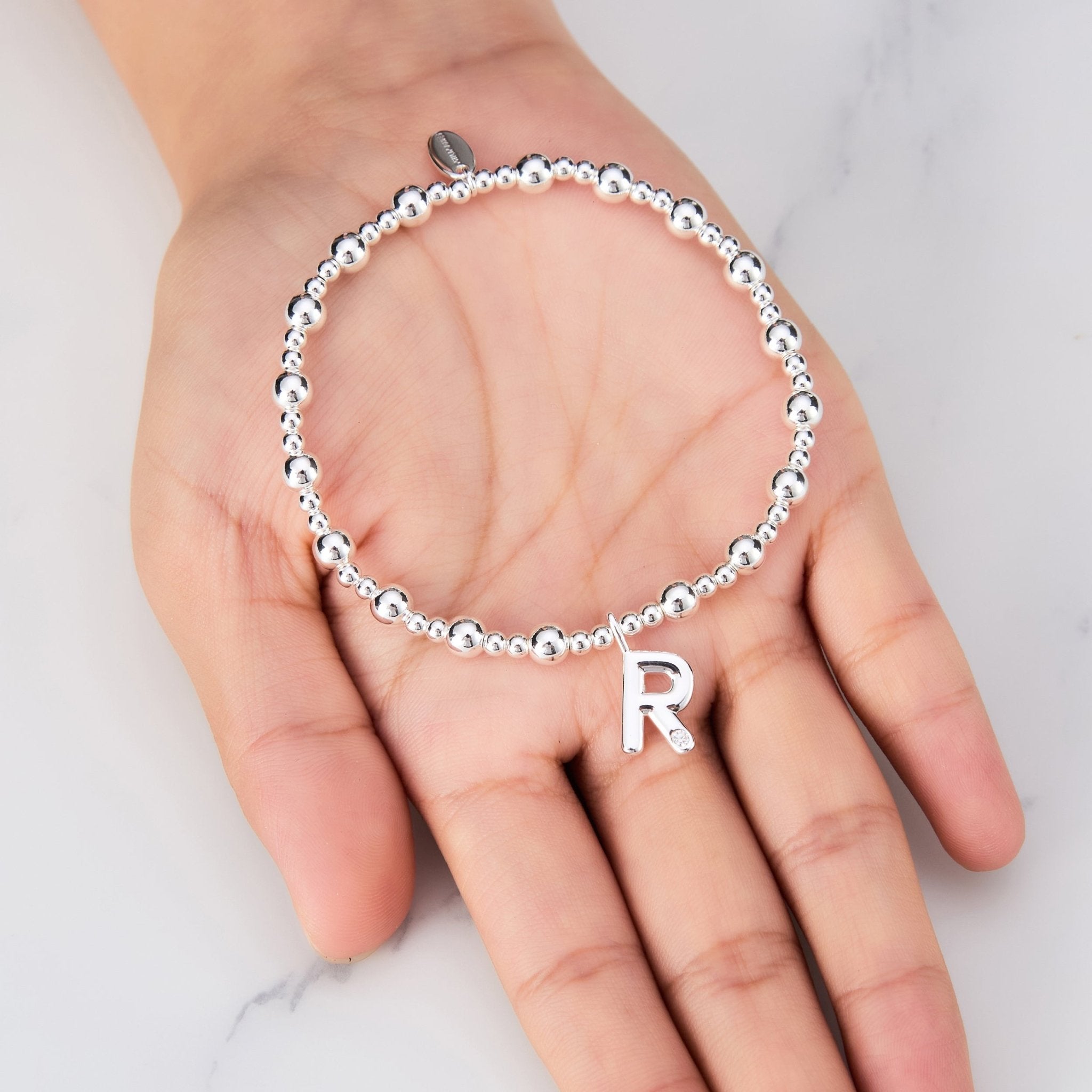 Letter R Initial Stretch Bracelet Created with Zircondia® Crystals