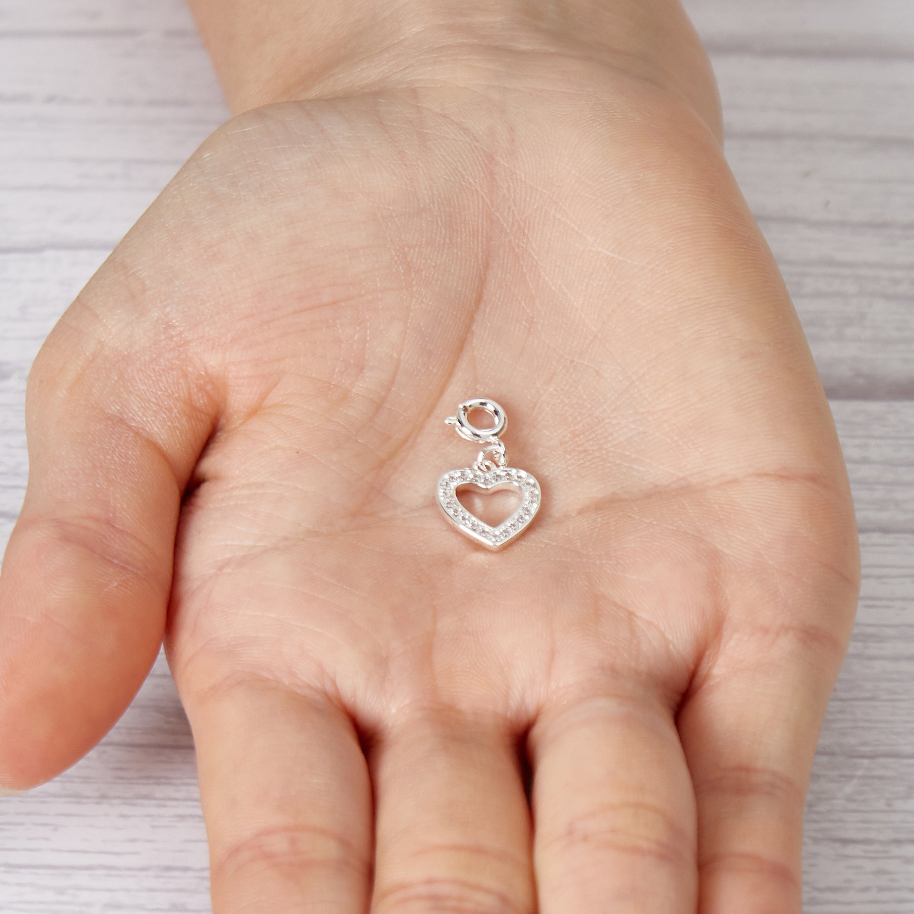 Open Heart Charm Created with Zircondia® Crystals