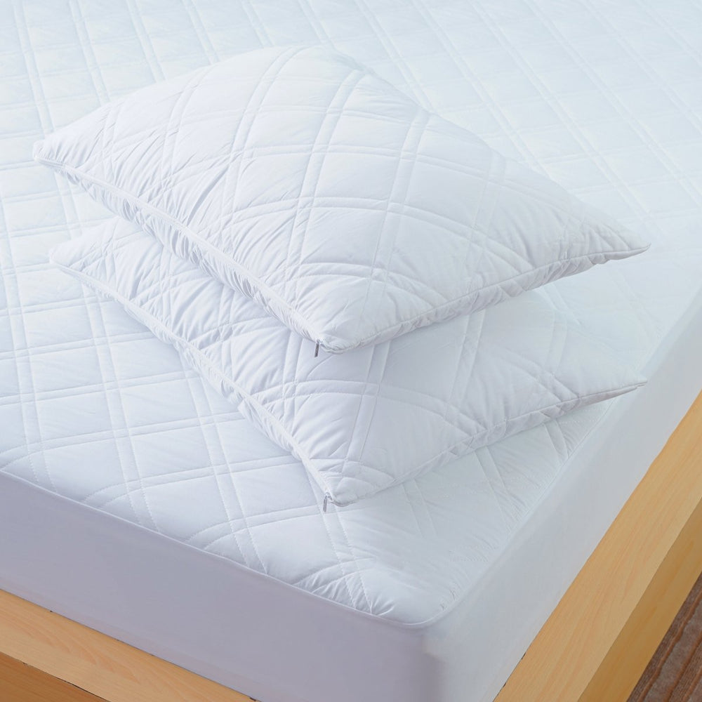 Luxurious White Quilted Pillow Protectors for Ultimate Sleep Comfort