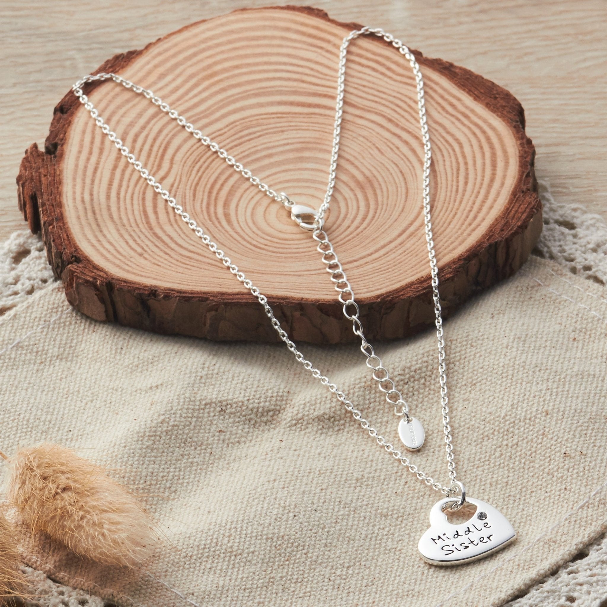 Rhodium Plated Middle Sister Heart Necklace Created with Zircondia® Crystals