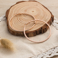 Rose Gold Plated 50mm Hoop Earrings Created with Zircondia® Crystals