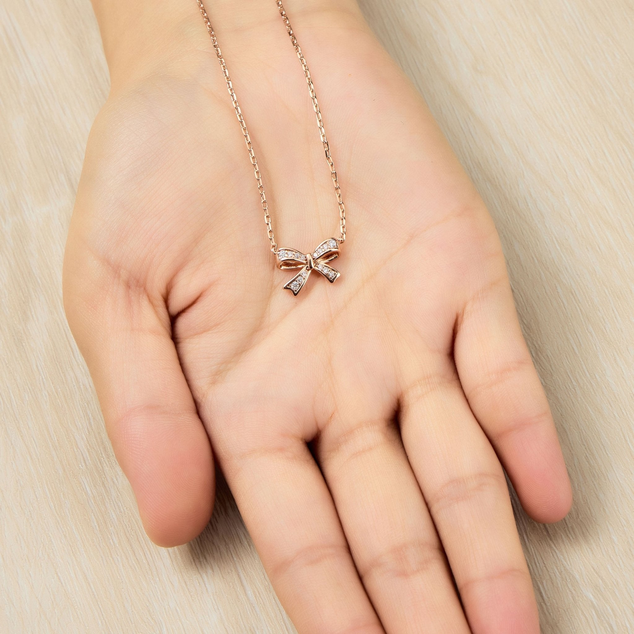 Rose Gold Plated Bow Necklace Created with Zircondia® Crystals
