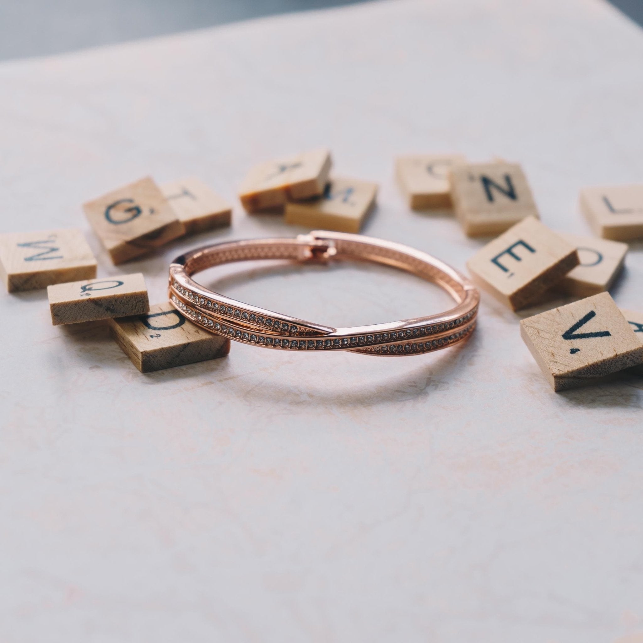 Rose Gold Plated Crossover Bangle Created with Zircondia® Crystals (7 Inch)
