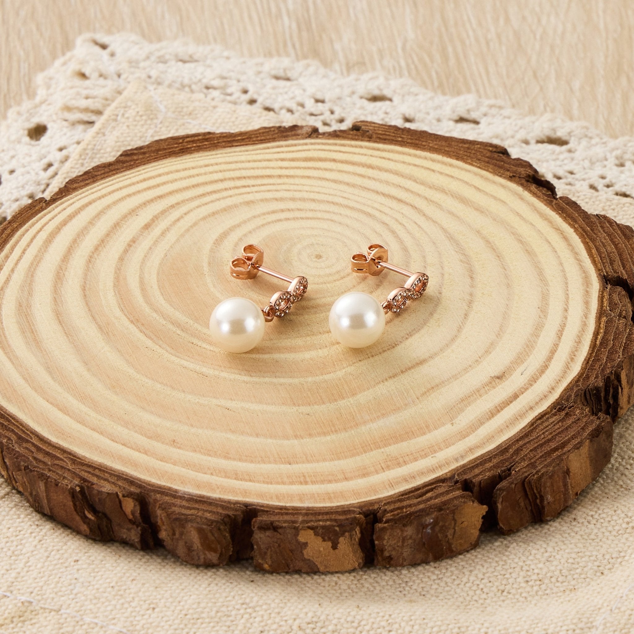 Rose Gold Plated Infinity Pearl Drop Earrings Created with Zircondia® Crystals