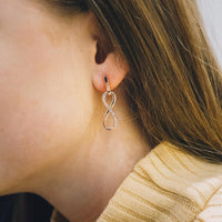 Rose Gold Plated Infinity Drop Earrings Created with Zircondia® Crystals