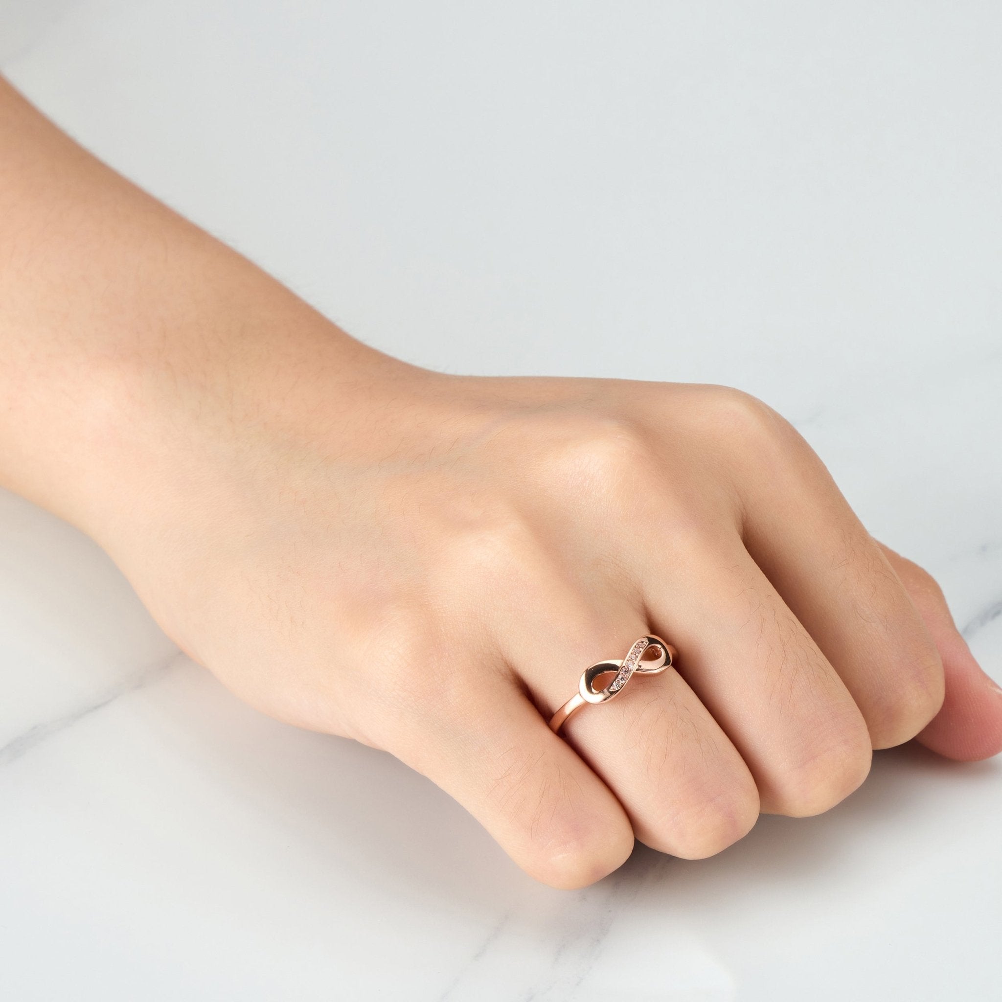 Rose Gold Plated Infinity Ring Created with Zircondia® Crystals