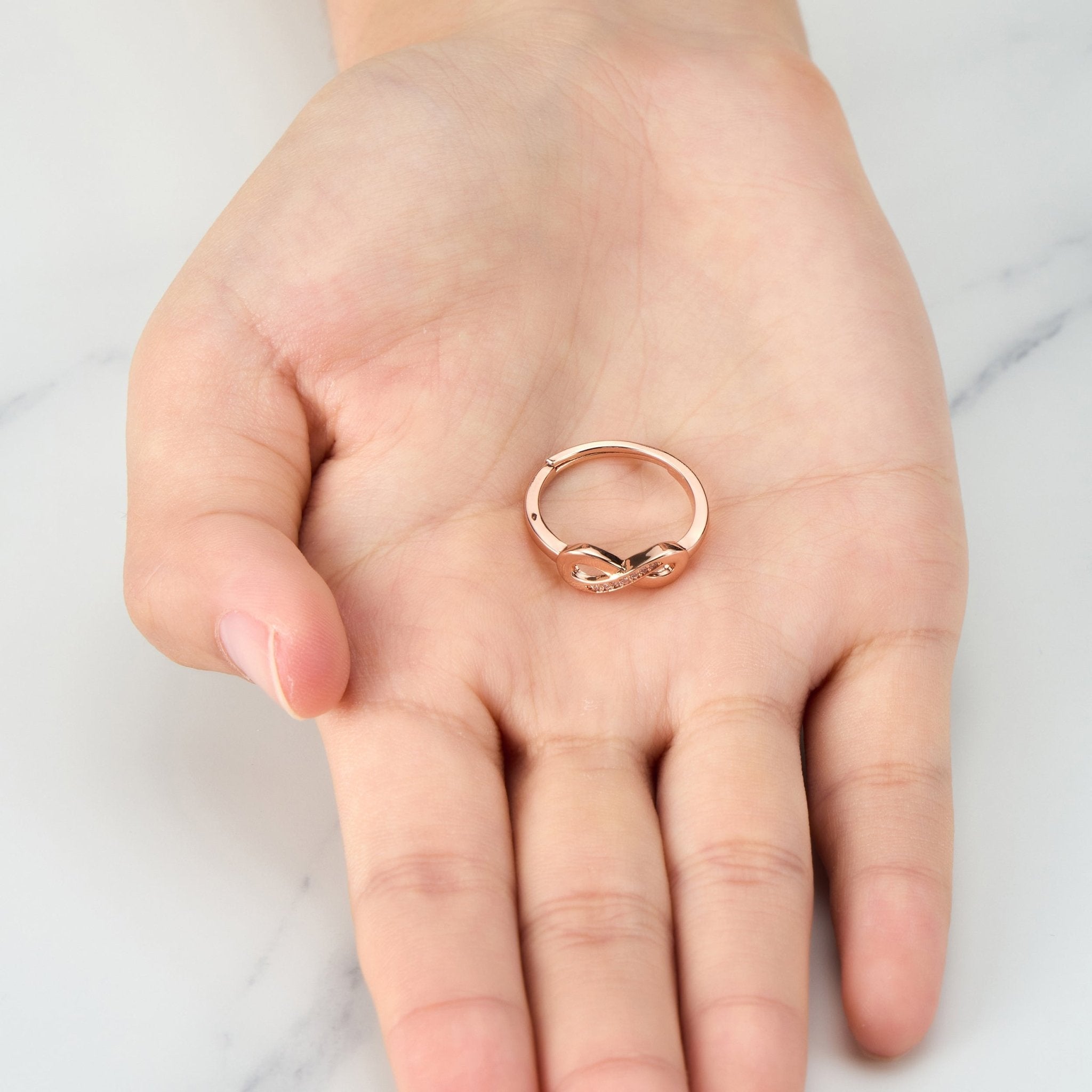 Rose Gold Plated Infinity Ring Created with Zircondia® Crystals