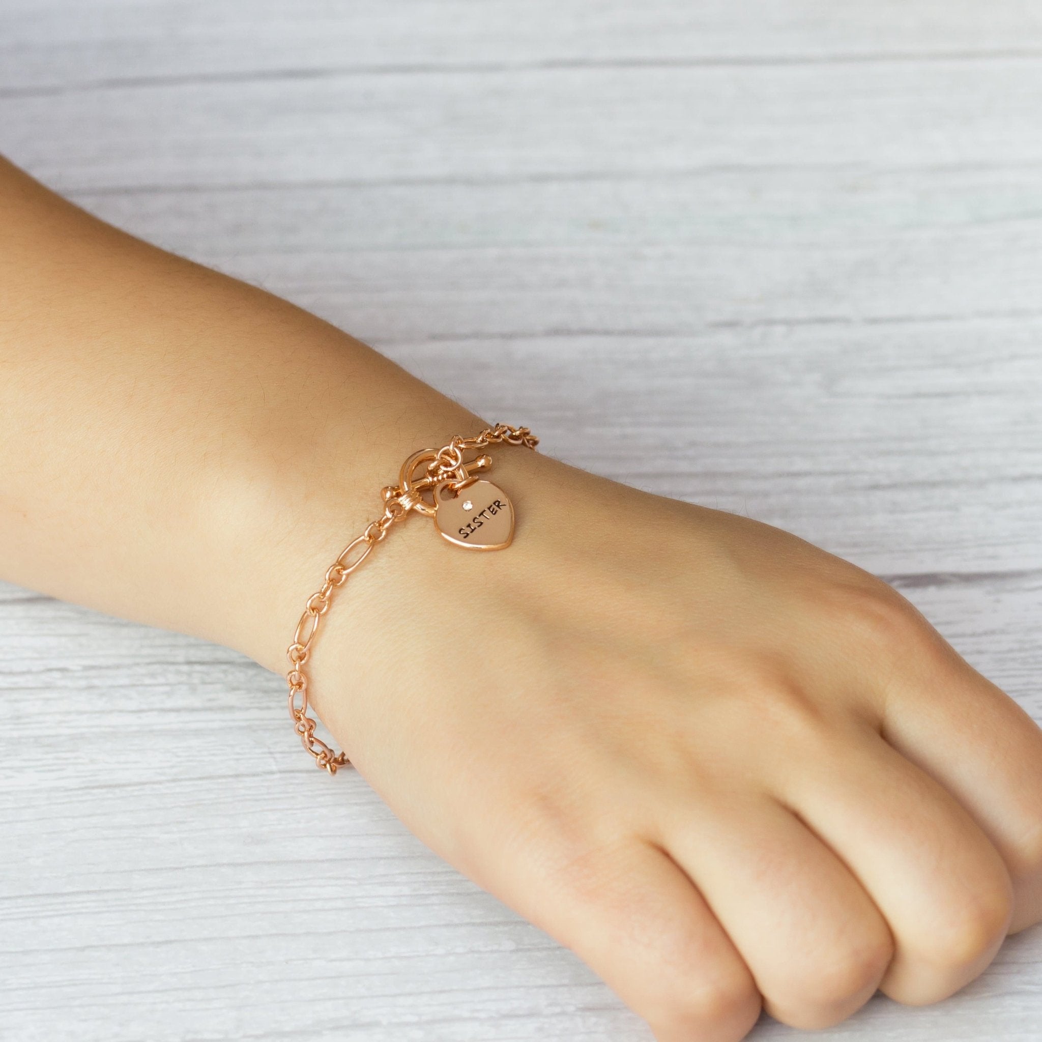 Rose Gold Plated Sister Charm Bracelet Created with Zircondia® Crystals