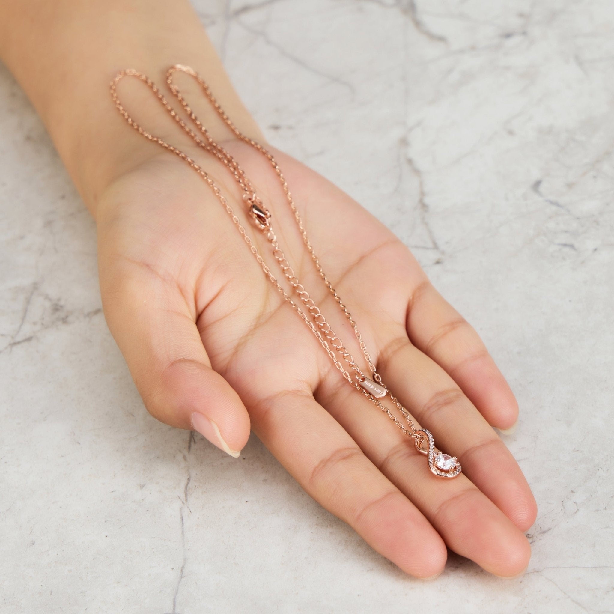 Rose Gold Plated Solitaire Twist Necklace Created with Zircondia® Crystals