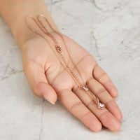 Rose Gold Plated Solitaire Twist Necklace Created with Zircondia® Crystals