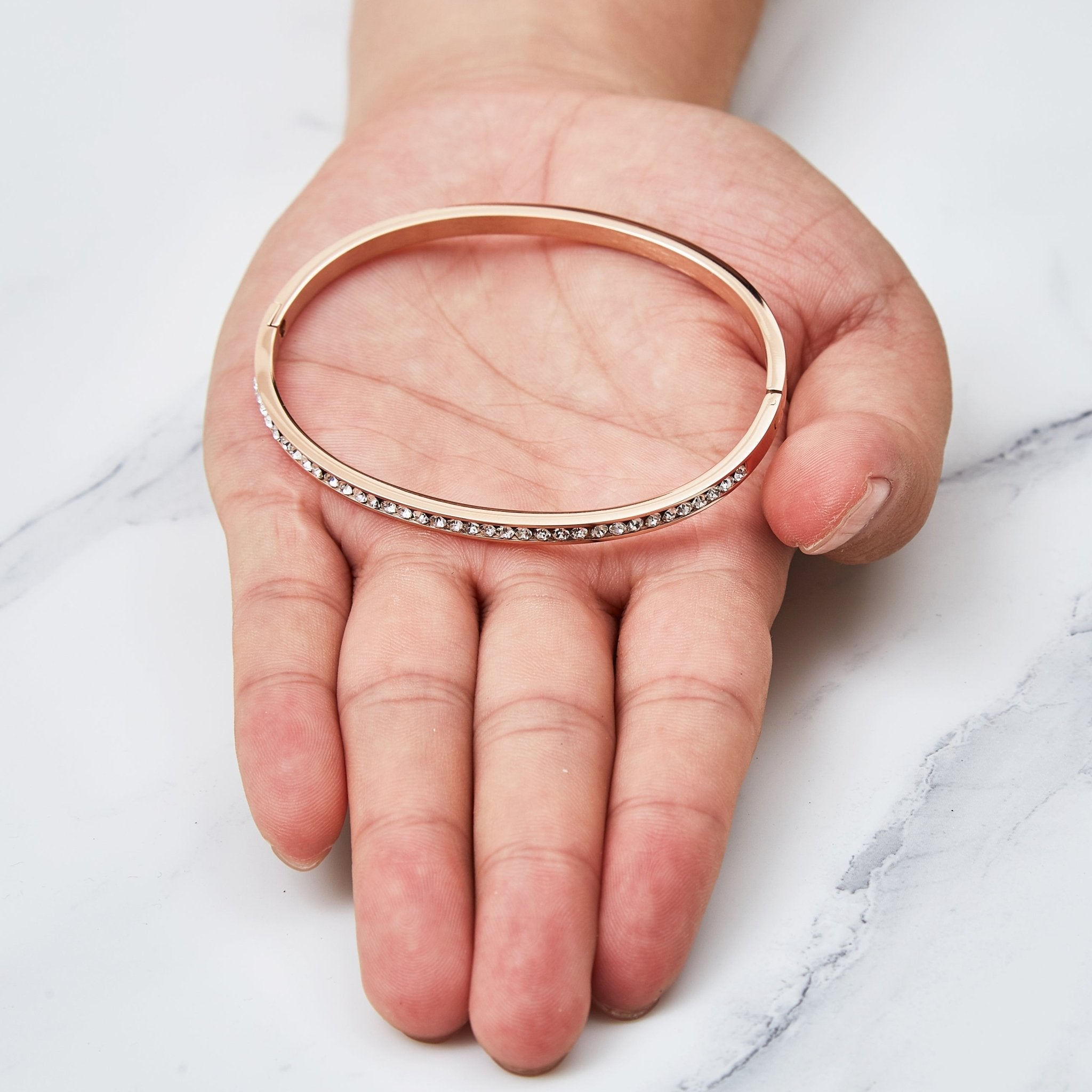 Rose Gold Plated Stainless Steel Channel Set Bangle Created with Zircondia® Crystals (7 Inch)