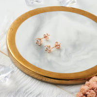 Rose Gold Plated Star Earrings Created with Zircondia® Crystals