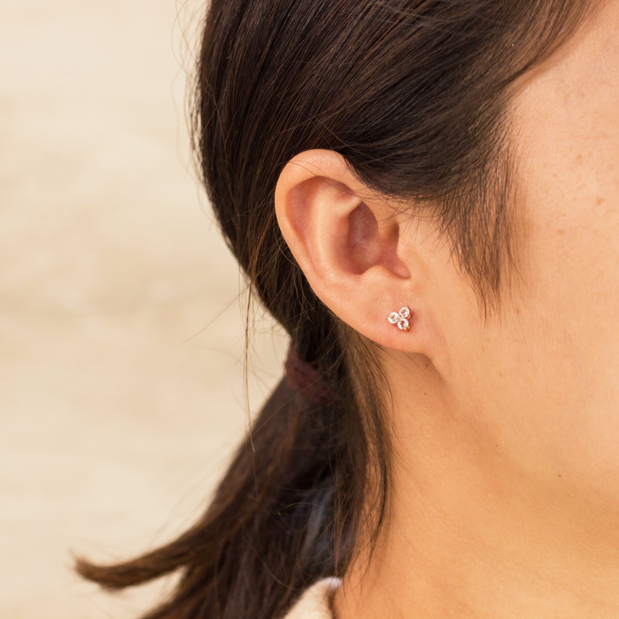 Rose Gold Plated Three Stone Earrings Created with Zircondia® Crystals