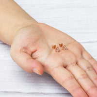 Rose Gold Plated Three Stone Earrings Created with Zircondia® Crystals