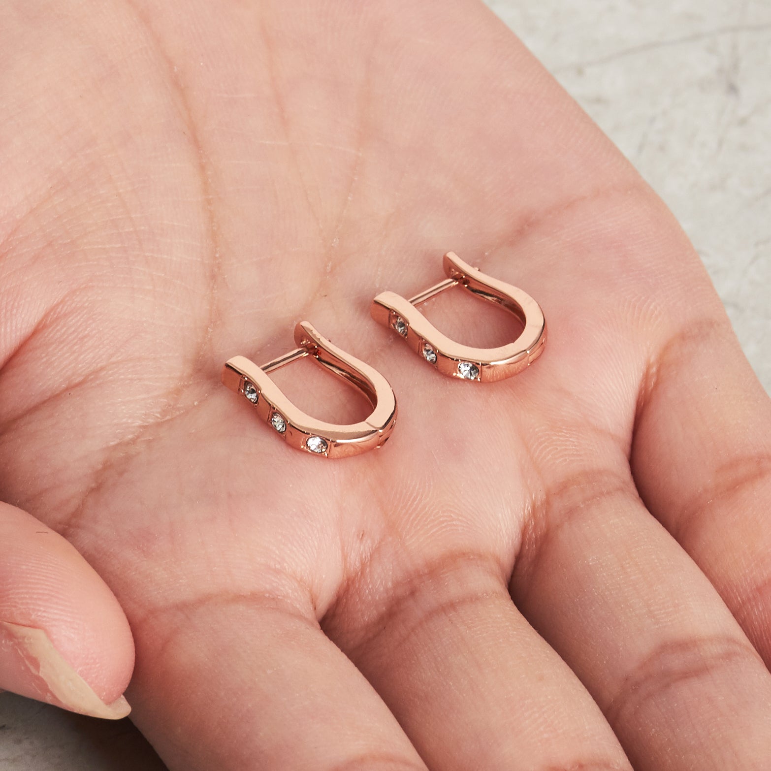 Rose Gold Plated Three Stone Hoop Earrings Created with Zircondia® Crystals