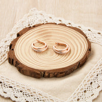 Rose Gold Plated Triple Illusion Hoop Earrings Created with Zircondia® Crystals