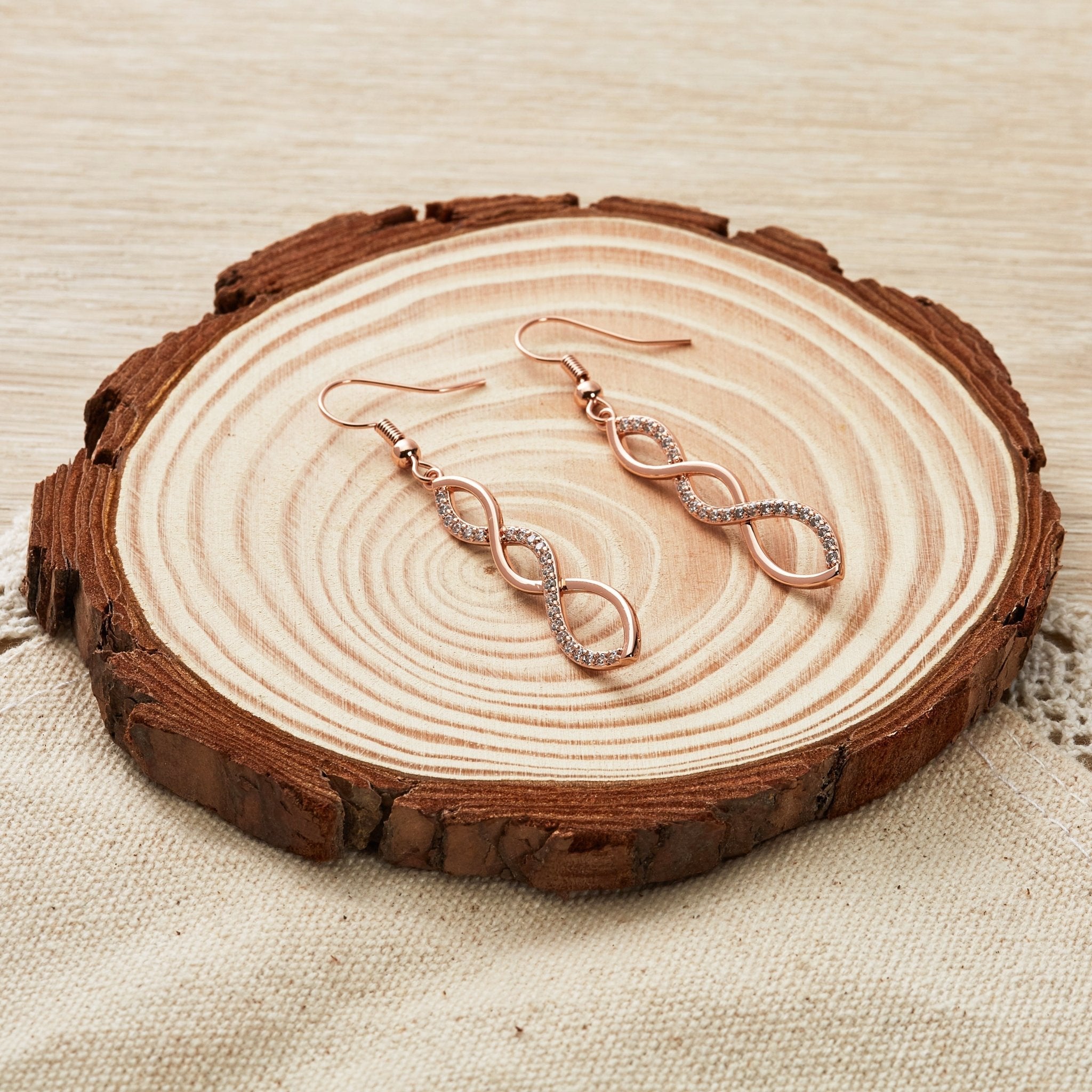 Rose Gold Plated Twist Drop Earrings Created with Zircondia® Crystals