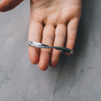 Silver Plated Arc Bangle Created with Zircondia® Crystals (7 Inch)